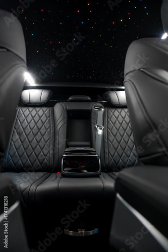 Comfortable interior of a passenger bus with soft seats