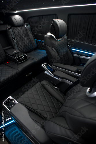 Comfortable interior of a passenger bus with soft seats