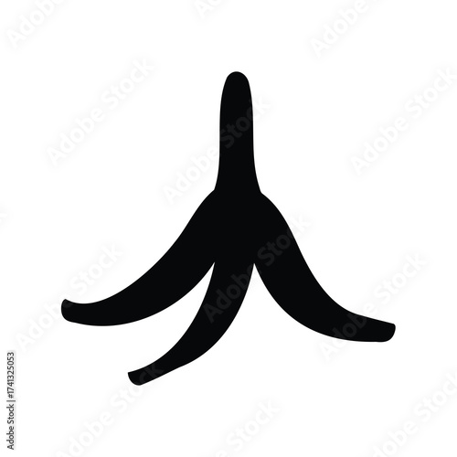 A discarded banana peel lays alone in monochrome, a symbol of comedic danger