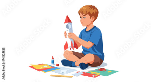 Boy Building a Rocket Model with Supplies.