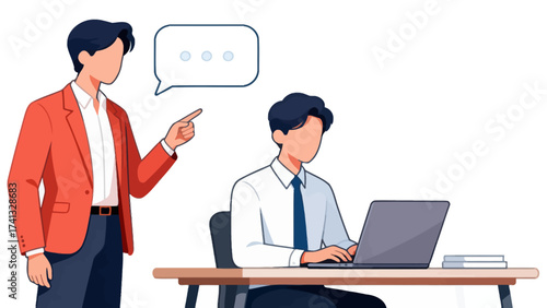 Two men in business attire interacting near laptop