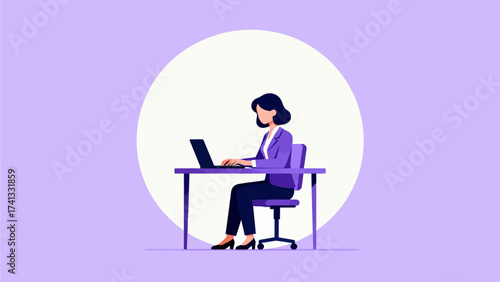 Woman working on laptop at desk