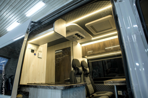 Comfortable interior of a passenger bus with soft seats