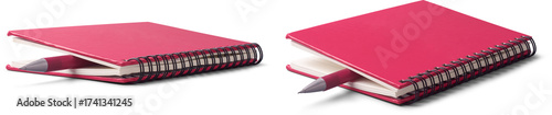 set of pink spiral-bound hardcover notebook with pen tucked between pages like bookmark isolated white background, writing, journaling, and education concept