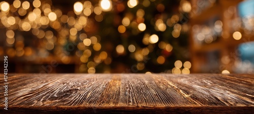 The rustic wooden table with festive bokeh background during a holiday celebration.