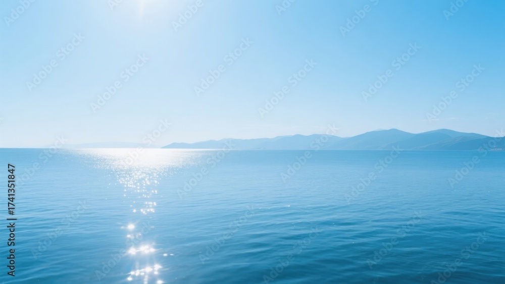 Fototapeta premium Serene ocean under clear blue sky