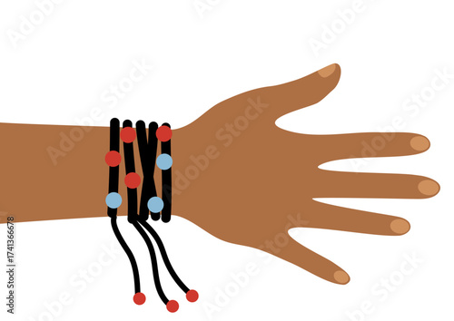 Hand of a woman wearing a black cord bracelet with red and light blue beads. Ethnically inspired design.