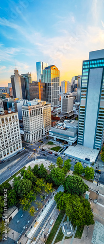 Panoramic view of Nashville skyline at sunset with river, skyscrapers, and city landmarks