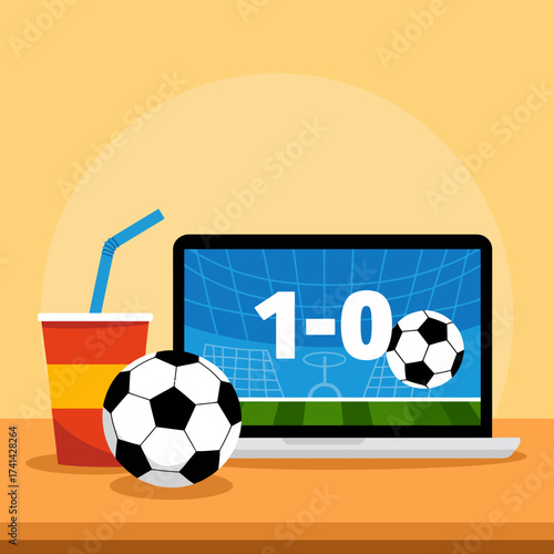 This image captures the excitement of a live soccer match displayed on a laptop screen, complete with score and refreshments that enhance the viewing experience.