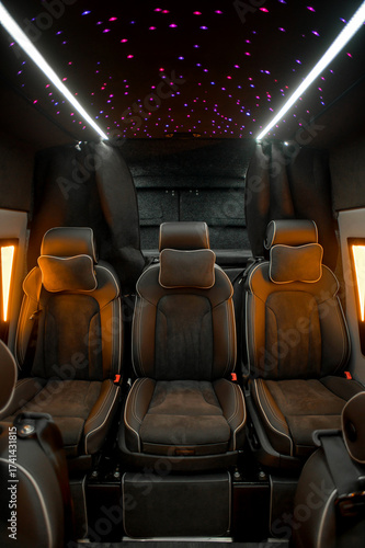 Comfortable interior of a passenger bus with soft seats