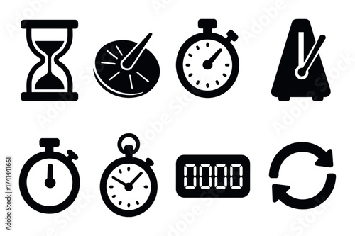 Collection of timers and metronomes on black background