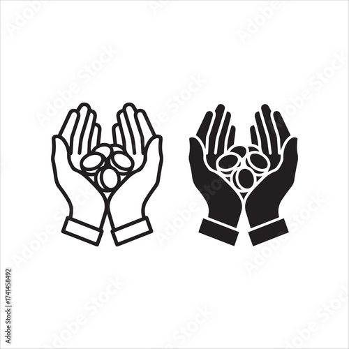 Two hands cupped together holding coins symbolizing generosity wealth and financial support