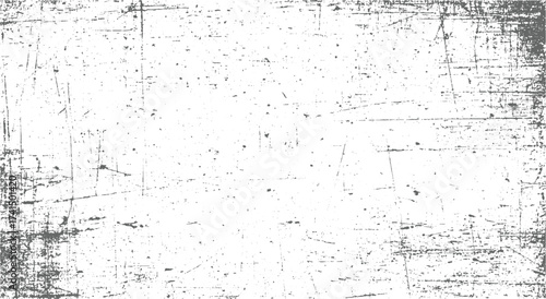 Gray scratches and speckles on white background texture grunge