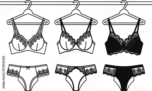 Fashionable lingerie set featuring bras and panties displayed on hangers