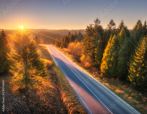 Aerial view of road in fore...