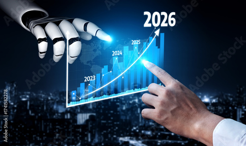 Canvas-taulu A conceptual image showing the interaction between a robotic hand and a human hand, visualizing a financial growth chart extending from 2023 to 2026 in a futuristic cityscape