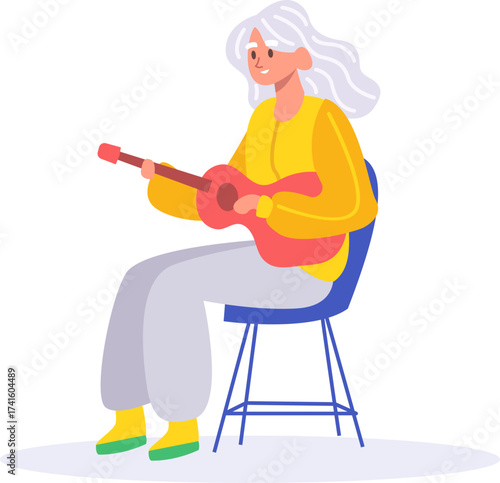 Elderly woman playing guitar enjoying music hobby