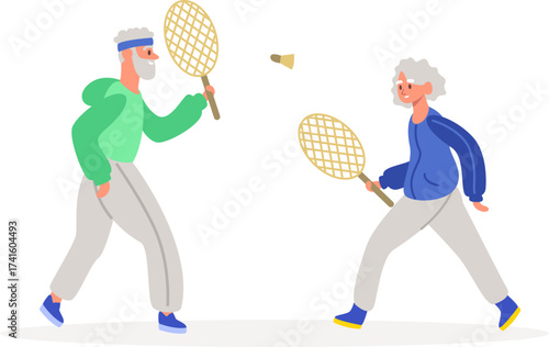 Elderly couple playing badminton enjoying active lifestyle activity