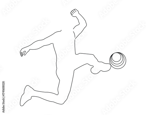 Silhouette of a soccer player kicking a ball