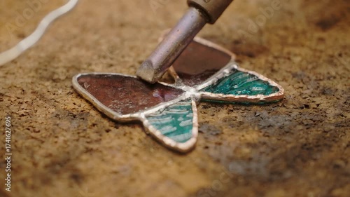Stained glass artisan creates handmade art, DIY soldering process
