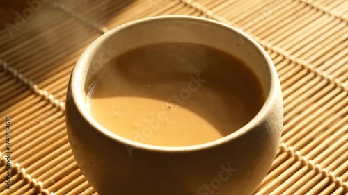 Warm Beverage Transitions From Cinematic Shot, Highlighting Texture And Subtle Steam