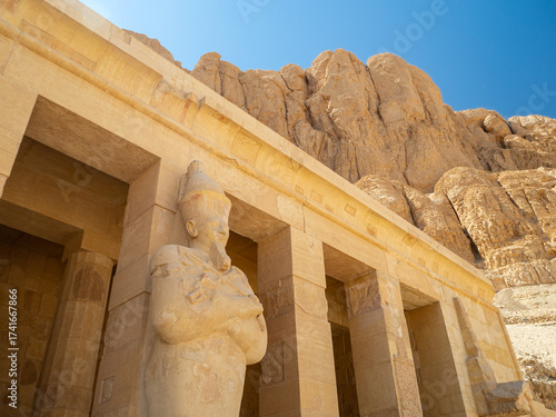 LUXOR, EGYPT : The Mortuary Temple of Hatshepsut at Valley of the Queens, an impressive ancient Egyptian monument built into limestone cliffs, visited by travelers from around the world.