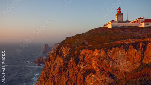 Lighthouse on Cabo da Roca - Roca Cape, westernmost point of the Sintra Mountain Range and Europe in Portuga