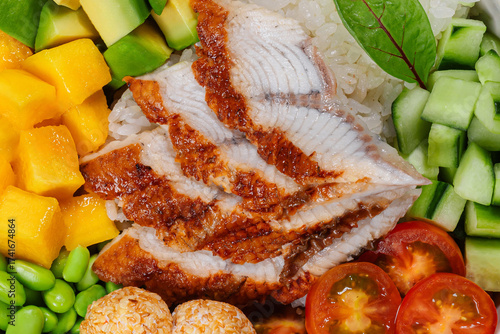 Poke bowl with grilled eel, avocado, mango and rice

Japanese sushi poke bowl with unagi and vegetables

Colorful poke bowl with eel, avocado and mango