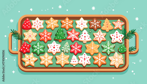 Christmas Holiday Cookies on Baking Tray. Festive Gingerbread, Star, Snowflake, and Tree Shaped Treats with Icing