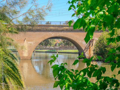 Photography Historical Brick arched tunnel bridge for sydney Meteo rail system over cooks river in inner west sydney suburb of Canterbury in NSW Australia