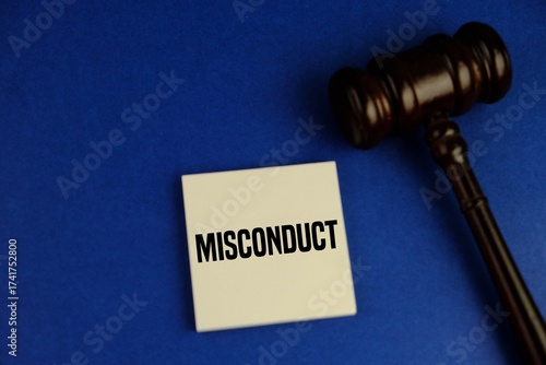 Legal Misconduct Concept with Wooden Judge Gavel on Court Table Symbolizing Justice Abuse, Corruption, and Unethical Behavior. 