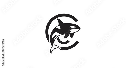 Elegant orca whale silhouette within circular emblem design for branding or logo use