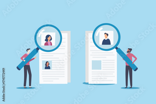 Two people examine resumes and profiles using large magnifying glasses for hiring and recruitment purposes