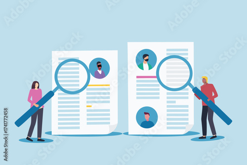 Two people examining resumes with magnifying glasses for hiring and recruitment process