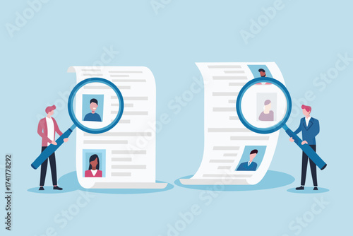 Two business people examine resumes with magnifying glasses searching for candidates