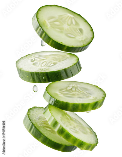 Fresh cucumber slices falling isolated healthy ingredient for salads and food preparation