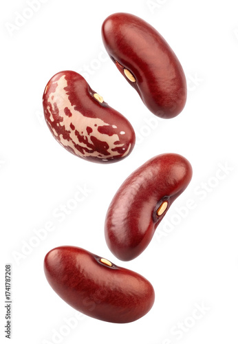 Several kidney beans falling in the air isolated