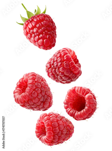 Delicious ripe red raspberries frozen in mid-air with detailed texture and vibrant color