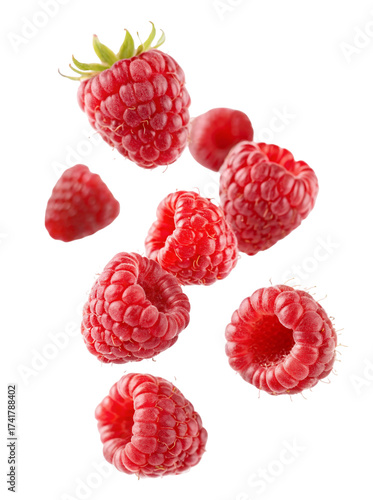 Fresh ripe raspberries cascading down in a visually appealing display