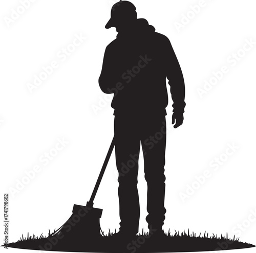 Black silhouette of a person sweeping grass broom