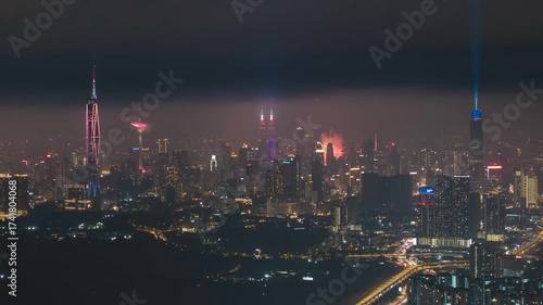 Wallpaper Mural Aerial view of night scene at Kuala Lumpur with fireworks show. Tilt down Torontodigital.ca