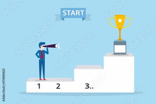 Businessman with telescope on first step of podium looking towards trophy at the top symbolizing ambition and success