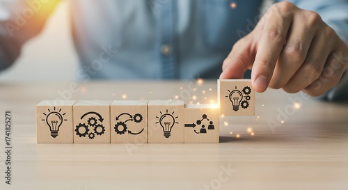 Wooden Blocks Showing Idea Process Placed by Hand on Table