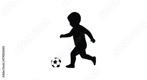 Playful silhouette of a young child kicking a soccer ball in dynamic motion isolated on white