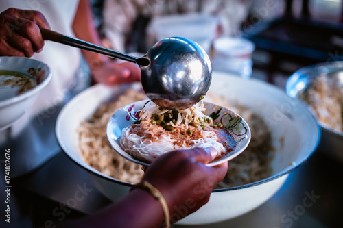 The hands of the hungry are asking for food from the donor