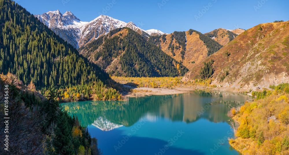 Obraz premium Aerial view of picturesque Lake Issyk in the Trans-Ili Alatau Mountains in southeastern Kazakhstan on an autumn morning