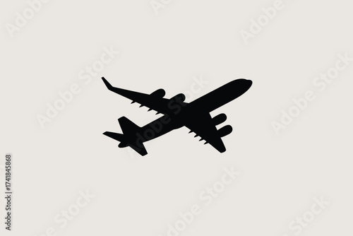 Black silhouette of a large jet airplane in flight aircraft