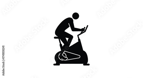 Silhouette of a person exercising on a stationary bicycle gym equipment for fitness and cardio workout