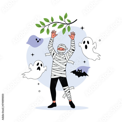 A person dressed as a mummy with ghost decorations around them.