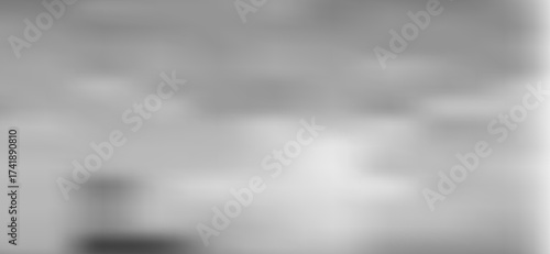 Abstract monochrome scene featuring ethereal, blurred gradients of gray and white, evoking a sense of depth and tranquility with subtle light variations, creating a soft, dreamy atmosphere